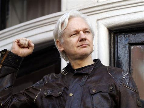 why was julian assange wanted